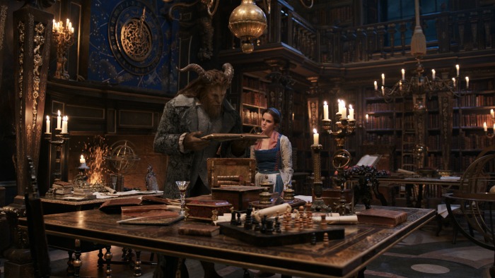 The Beast (Dan Stevens) and Belle (Emma Watson) in the castle library in Disney's BEAUTY AND THE BEAST, a live-action adaptation of the studio's animated classic which is a celebration of one of the most beloved stories ever told.
